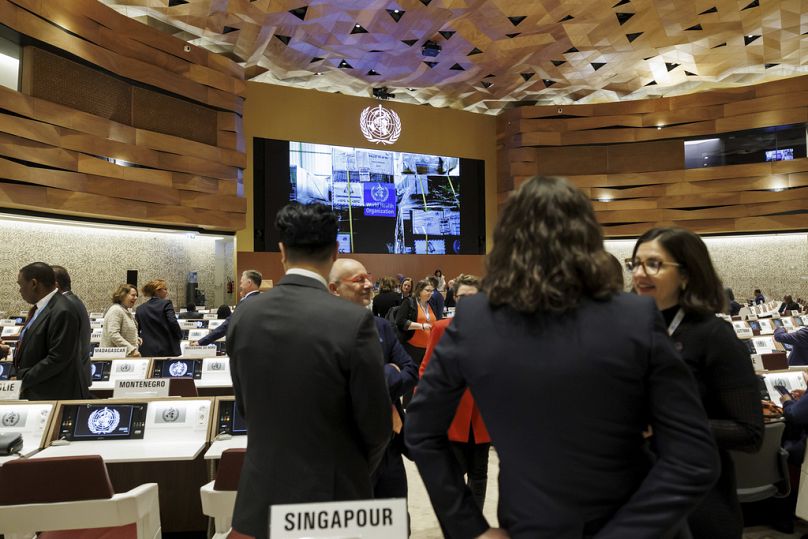 Delegates arrive for the opening of the 77th World Health Assembly (WHA77) at the European headquarters of the United Nations in Geneva, Switzerland, Monday, May 27, 2024.